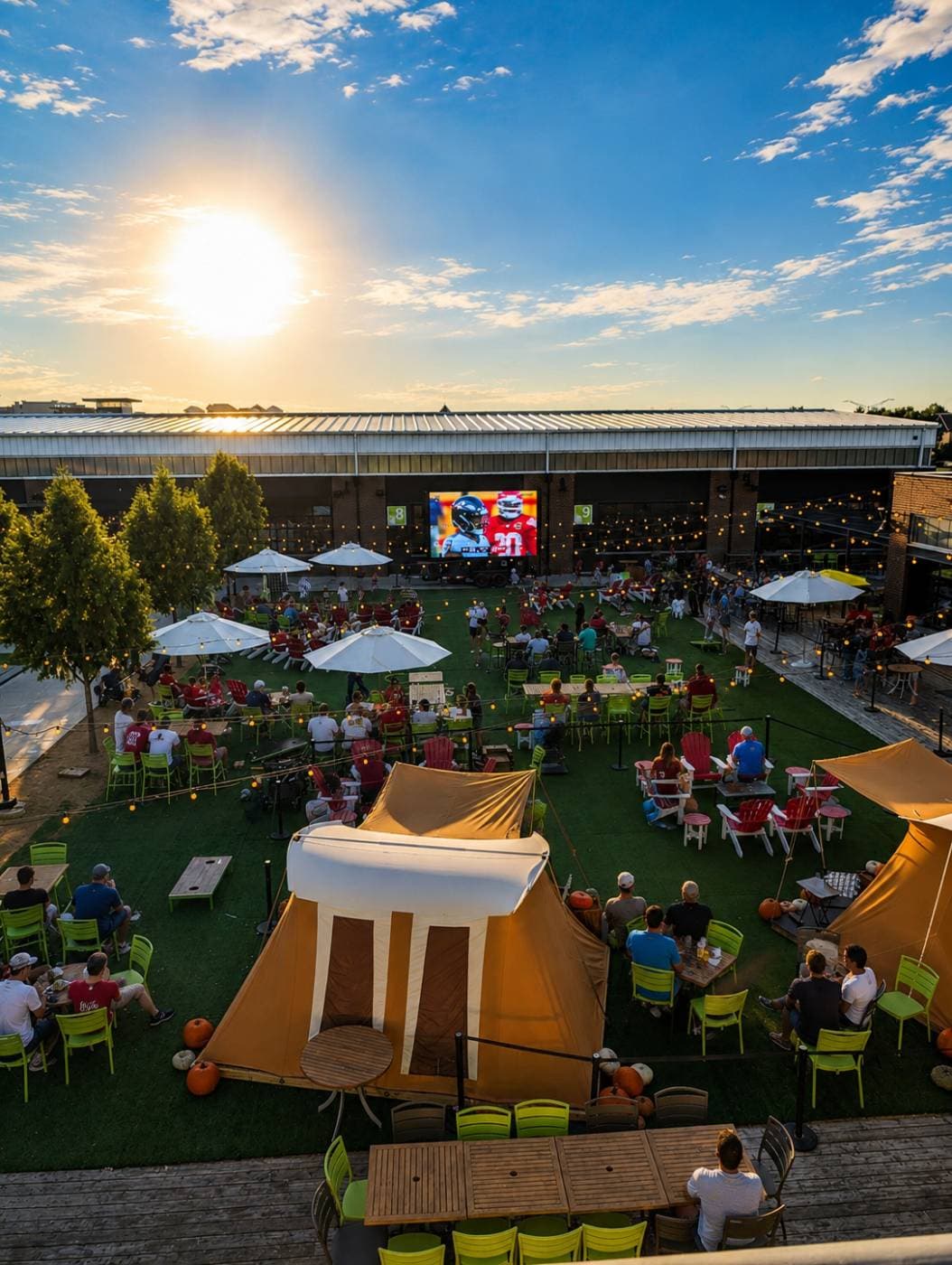 Showtime 12′ × 7′ mobile LED screen trailer raised at an outdoor patio event