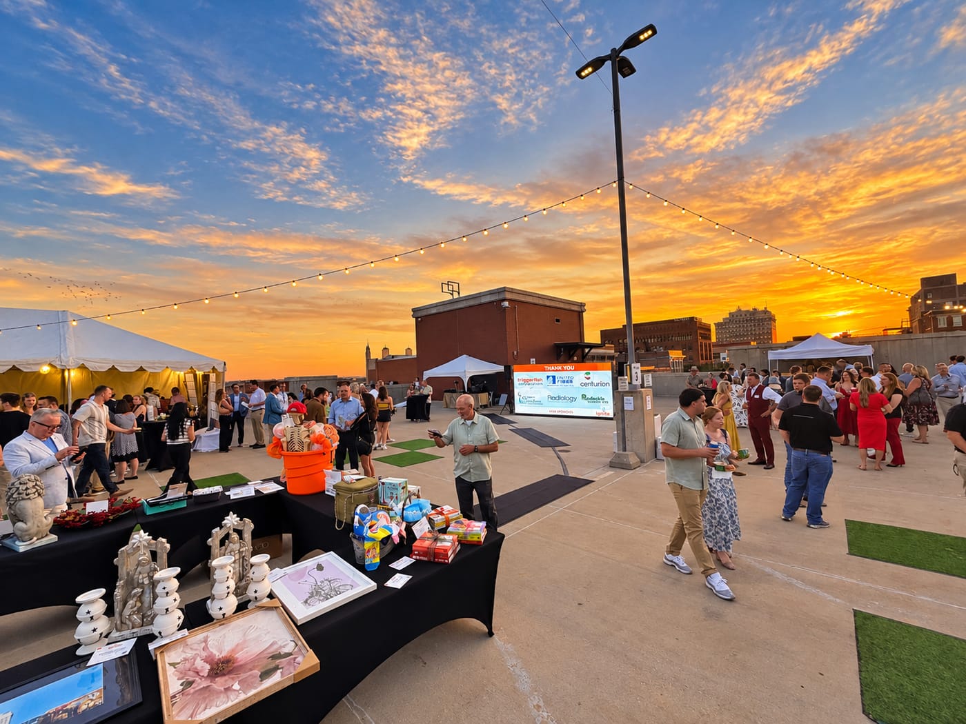 Showtime custom LED wall showing sponsor thank-yous at a rooftop fundraiser at sunset